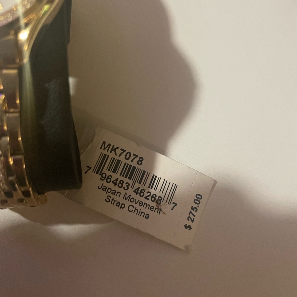 Michael Kors gold watch White face